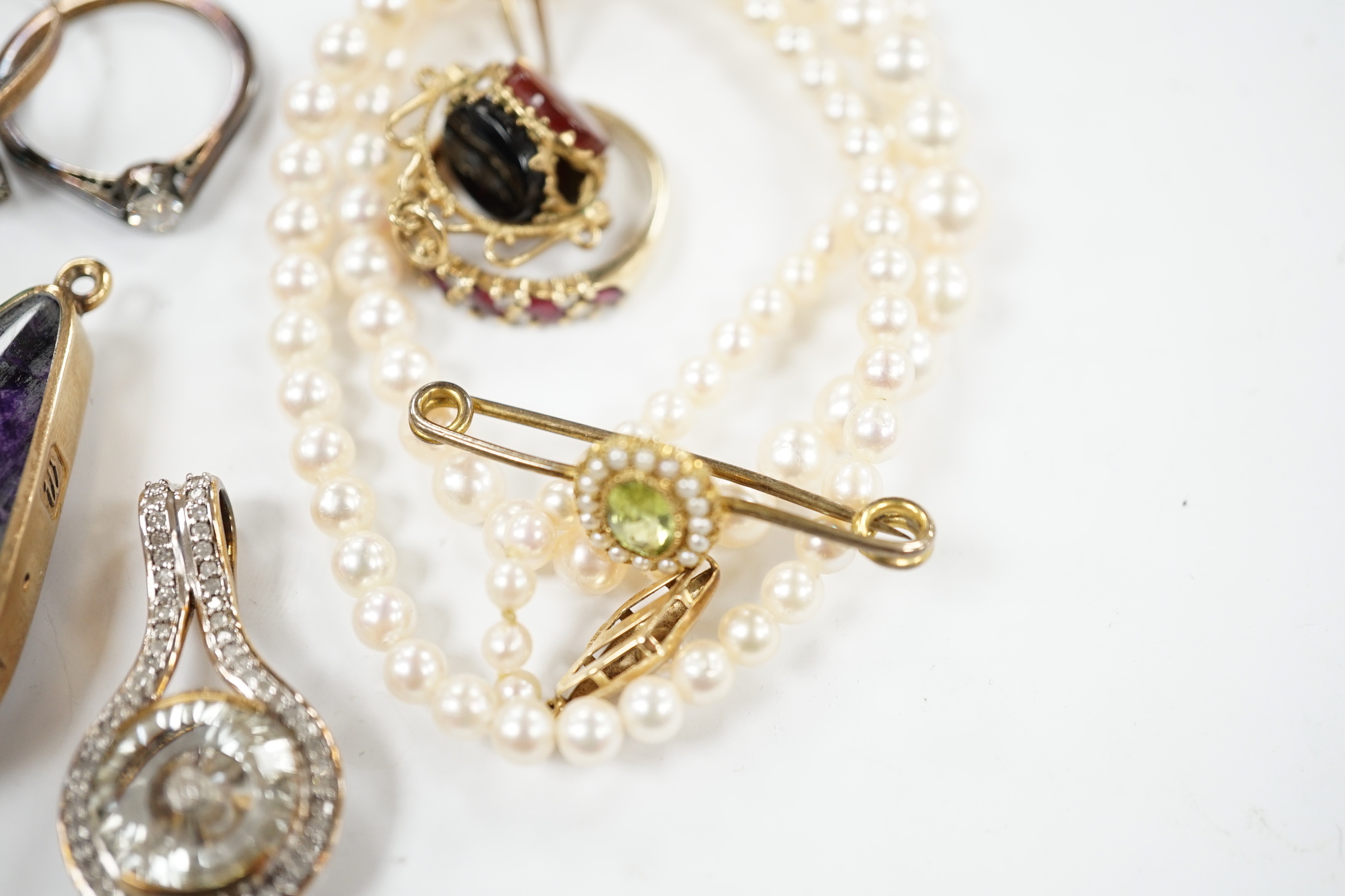 A small group of mainly modern 9ct jewellery including three gem rings, including solitaire diamond, five gem set pendants, including 9ct gold mounted banded agate and blue john, by David Scott Walker, a pair of lapis la